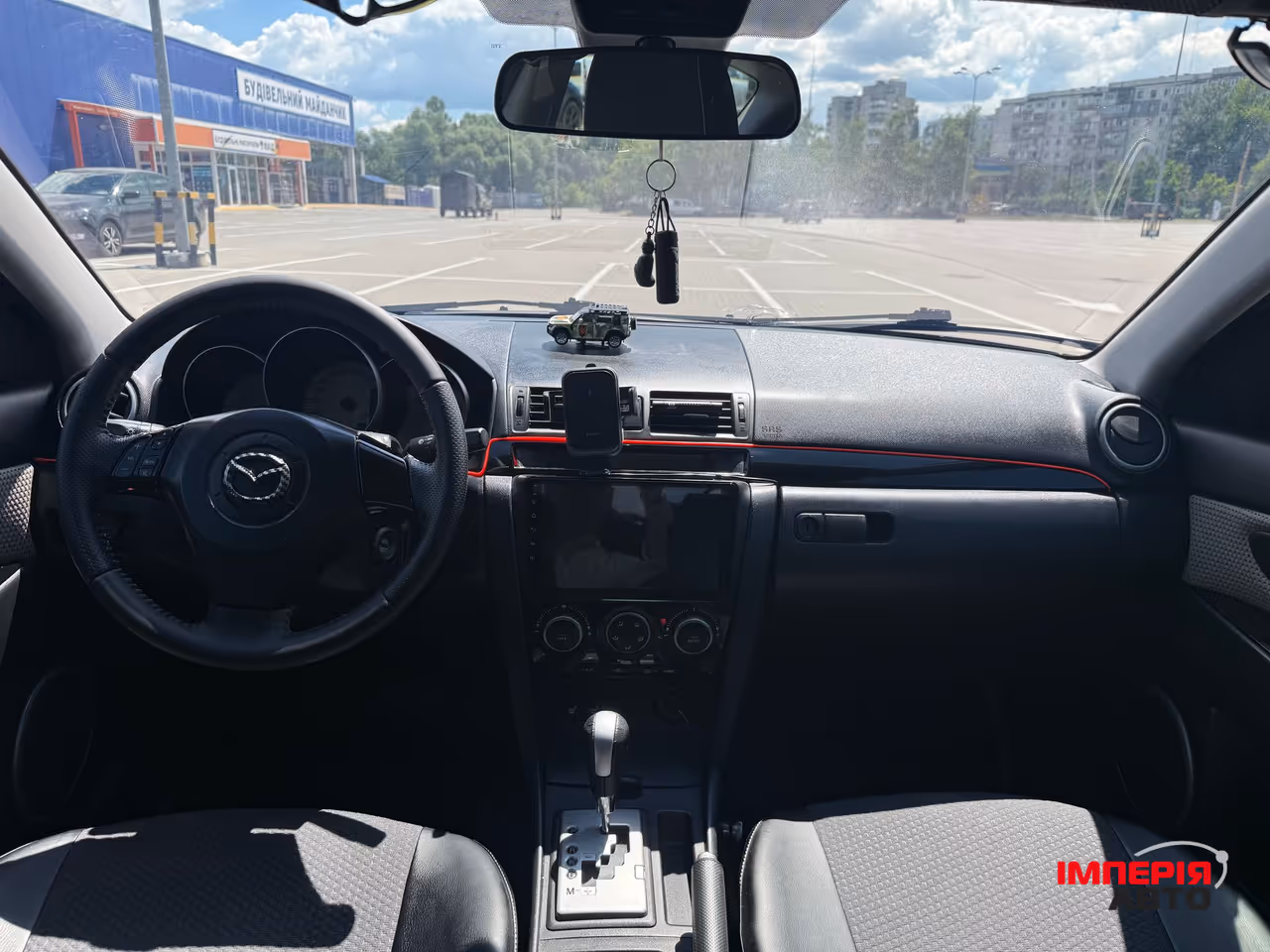 Mazda 3 - фото 11