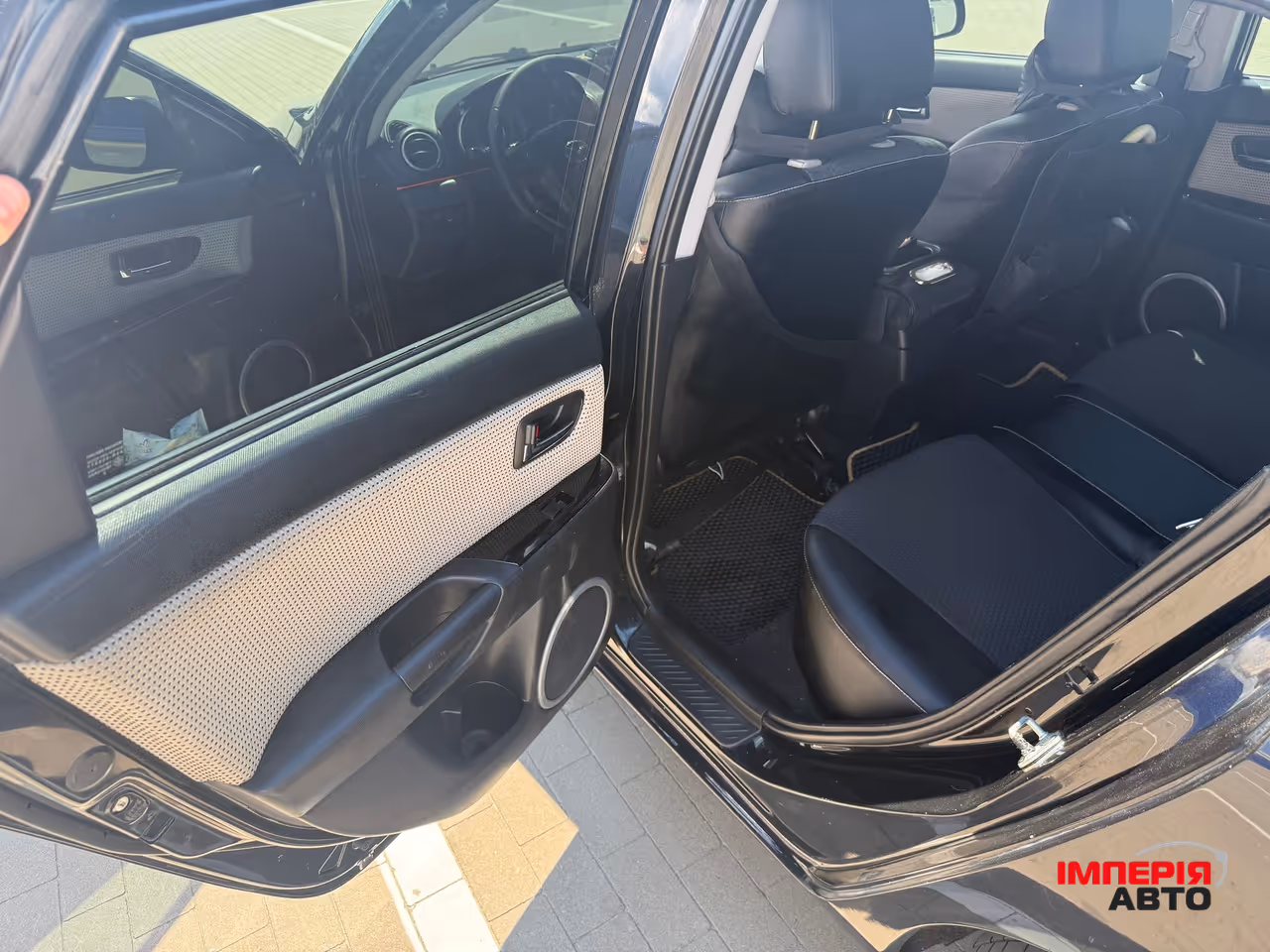 Mazda 3 - фото 13