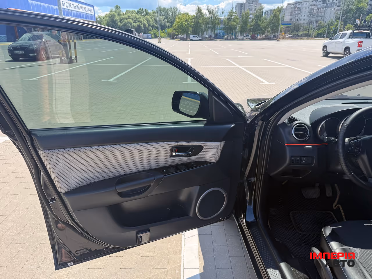Mazda 3 - фото 12