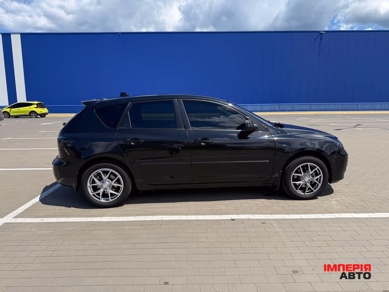 Mazda 3 - фото 7