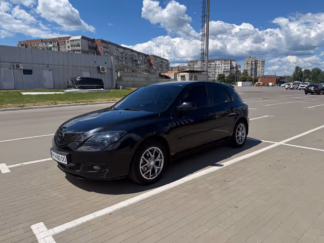 Mazda 3 - фото 3