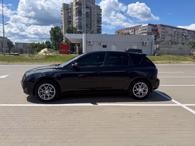 Mazda 3 - фото 4