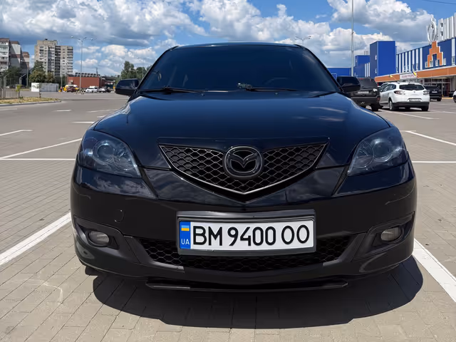 Mazda 3 - фото 1