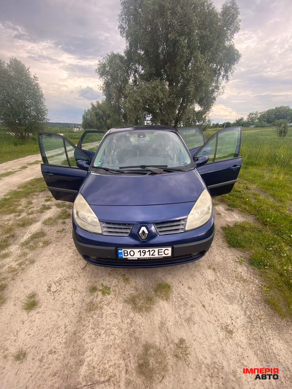 Renault Scenic - фото 11