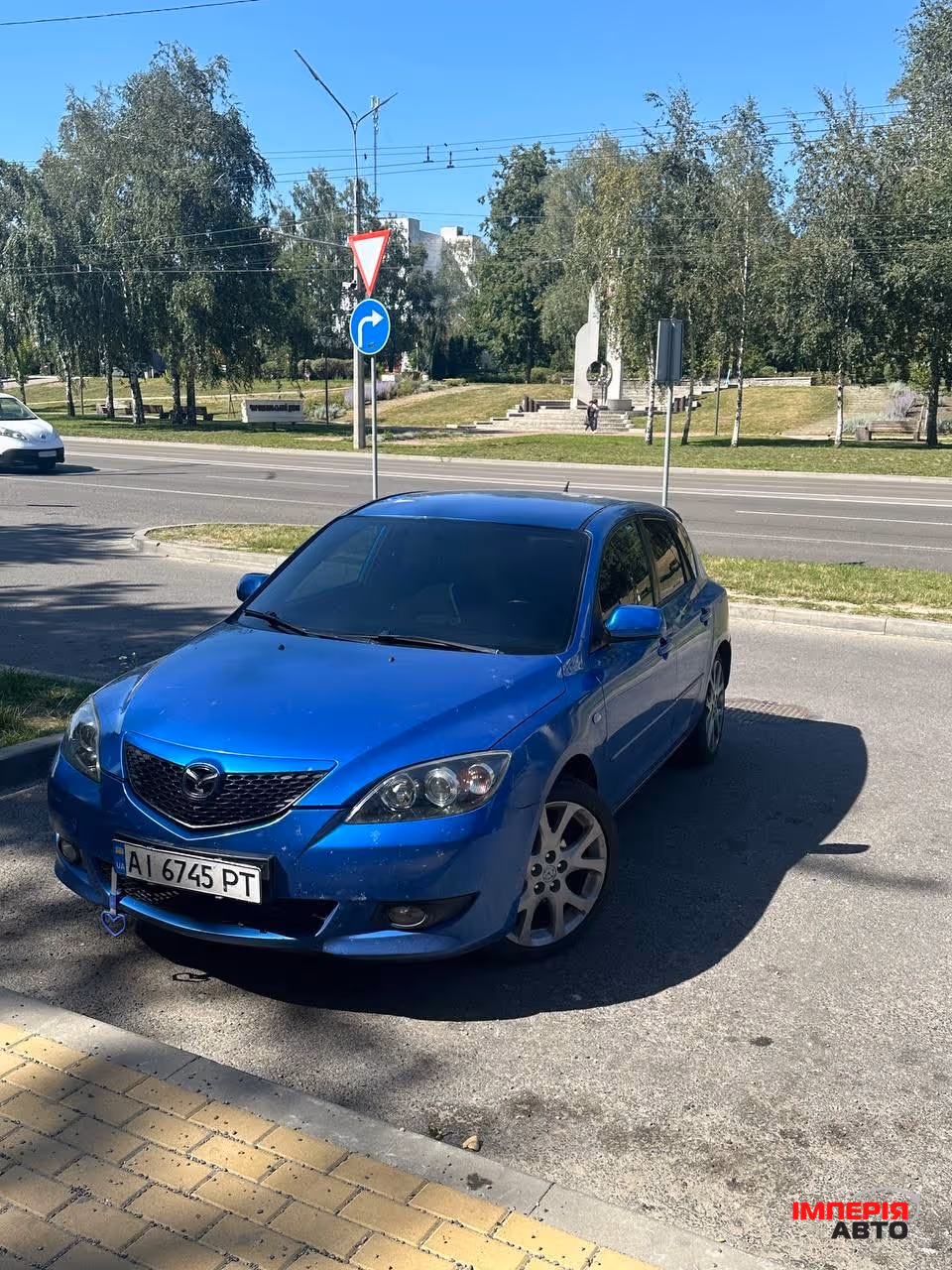 Mazda 3 - фото 1