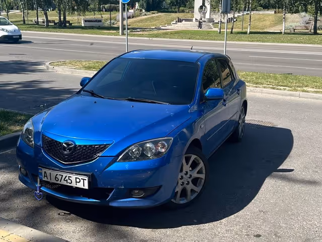 Mazda 3 - фото 1