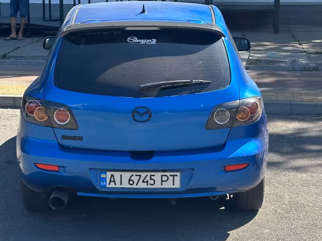 Mazda 3 - фото 4