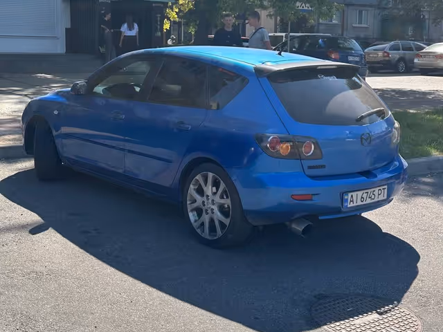 Mazda 3 - фото 5