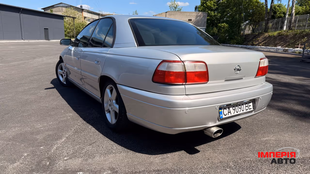 Opel Omega - фото 47