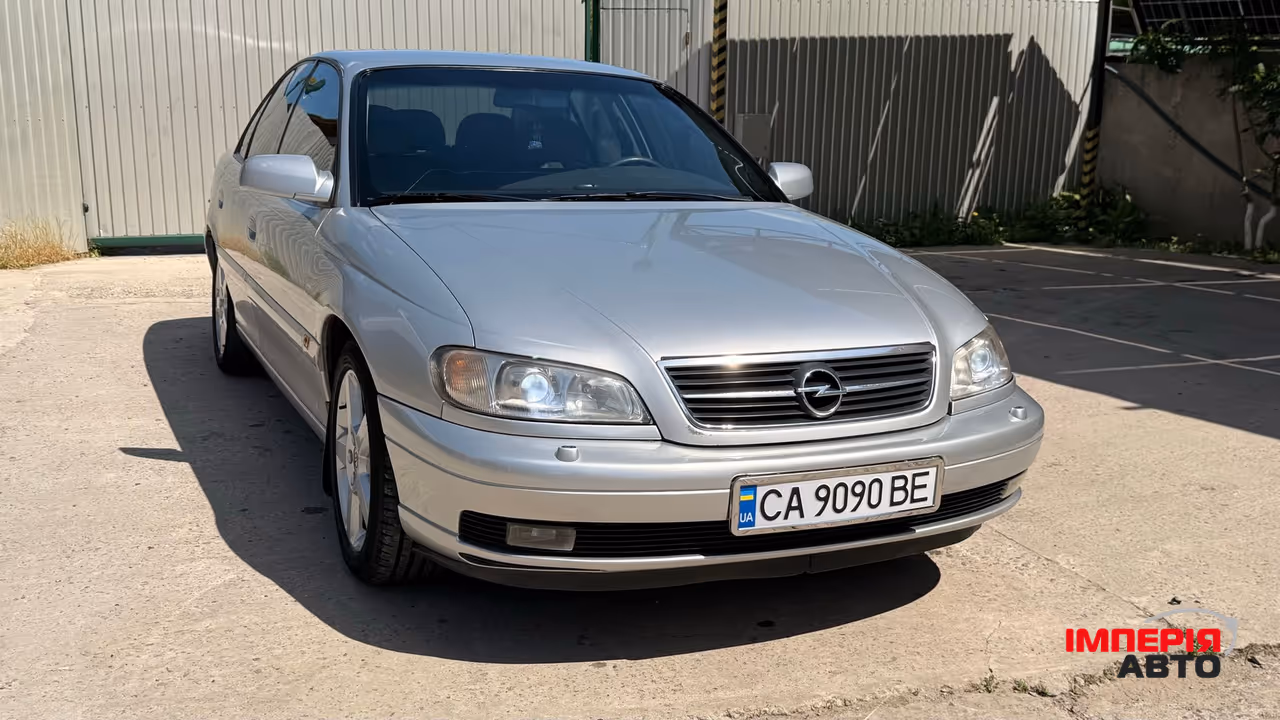 Opel Omega - фото 32