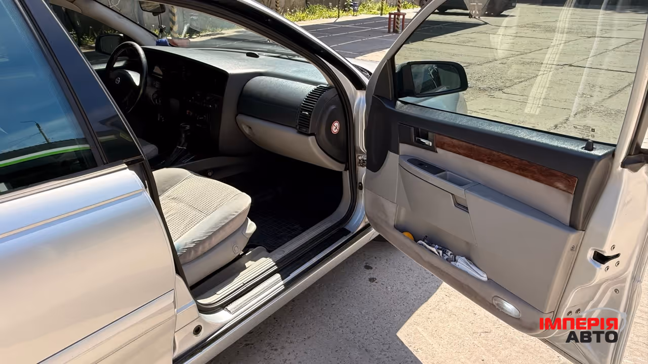 Opel Omega - фото 26