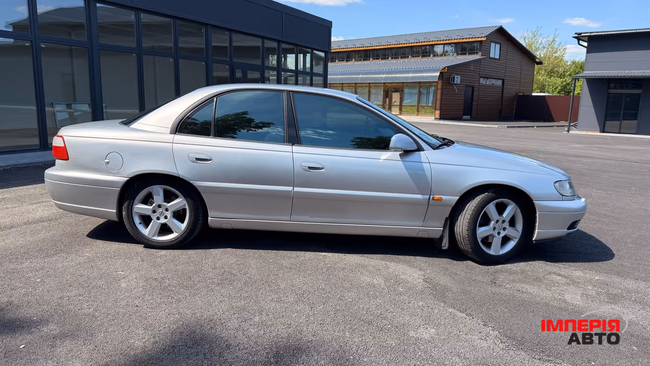 Opel Omega - фото 43