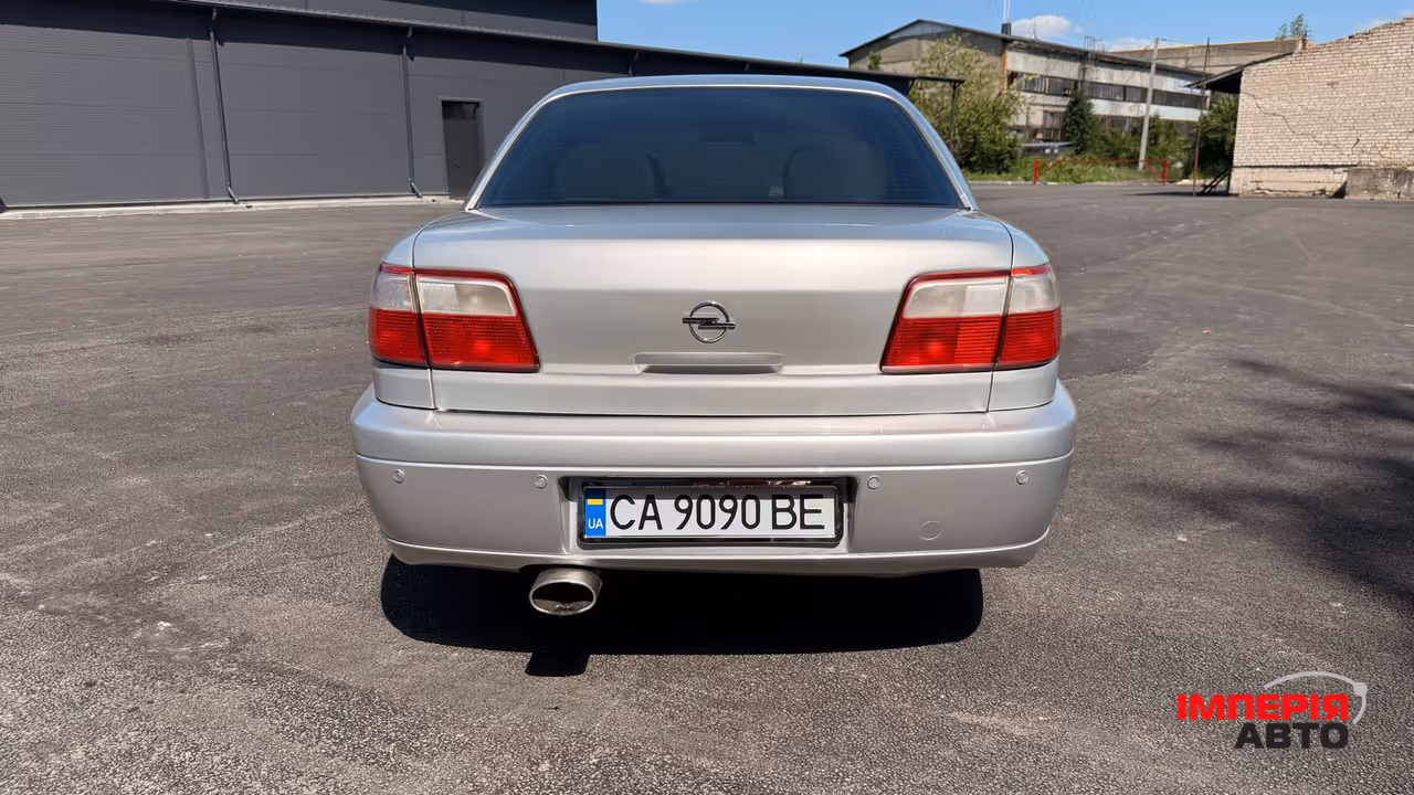 Opel Omega - фото 46