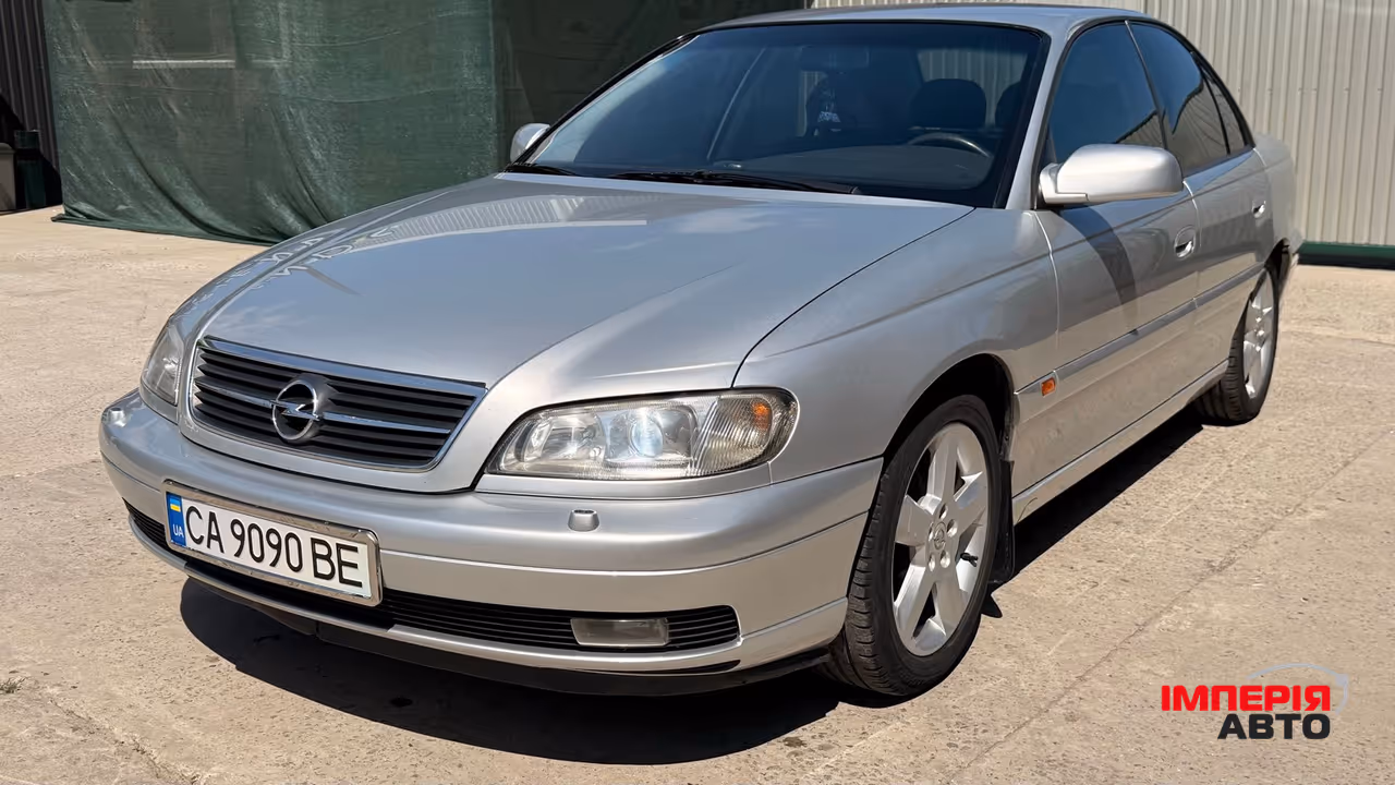 Opel Omega - фото 33