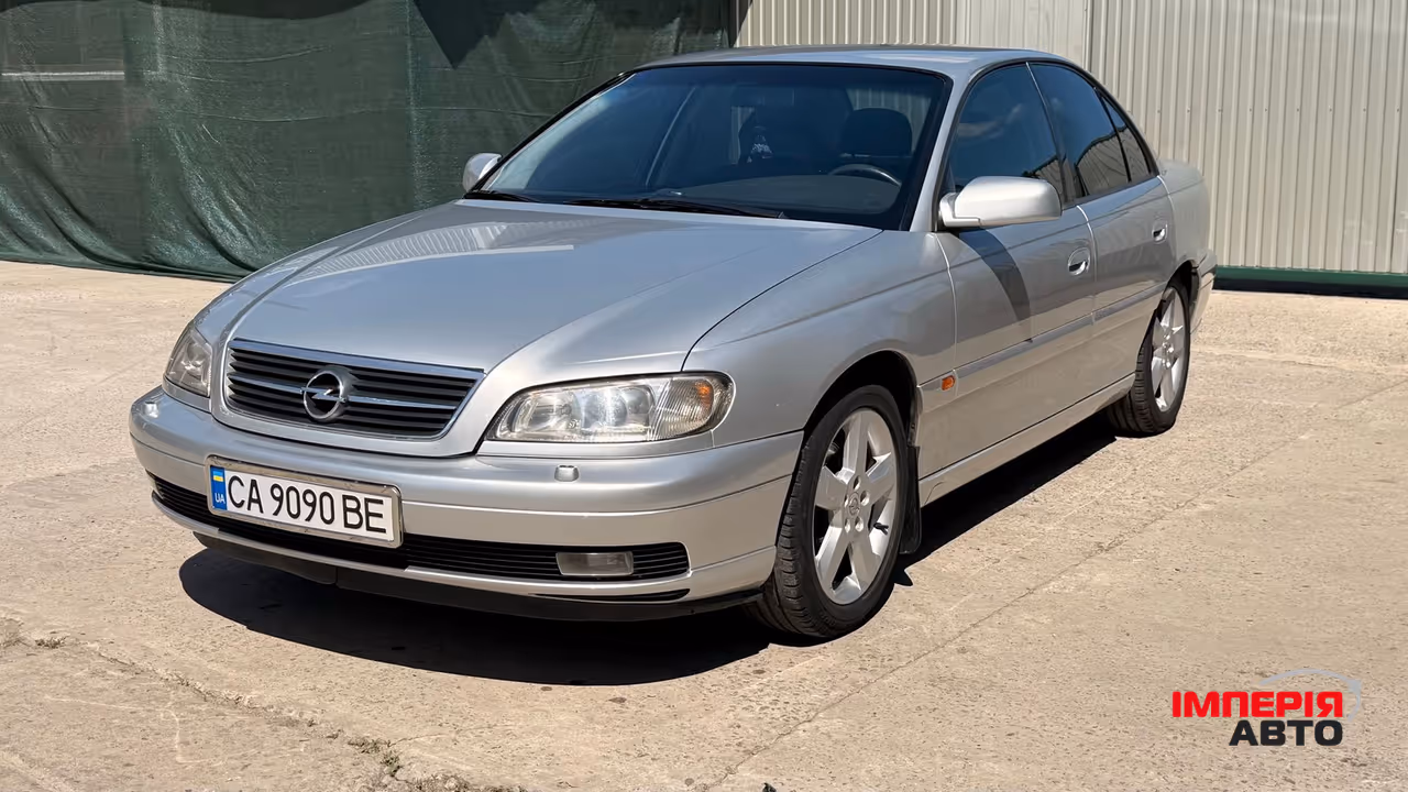 Opel Omega - фото 15