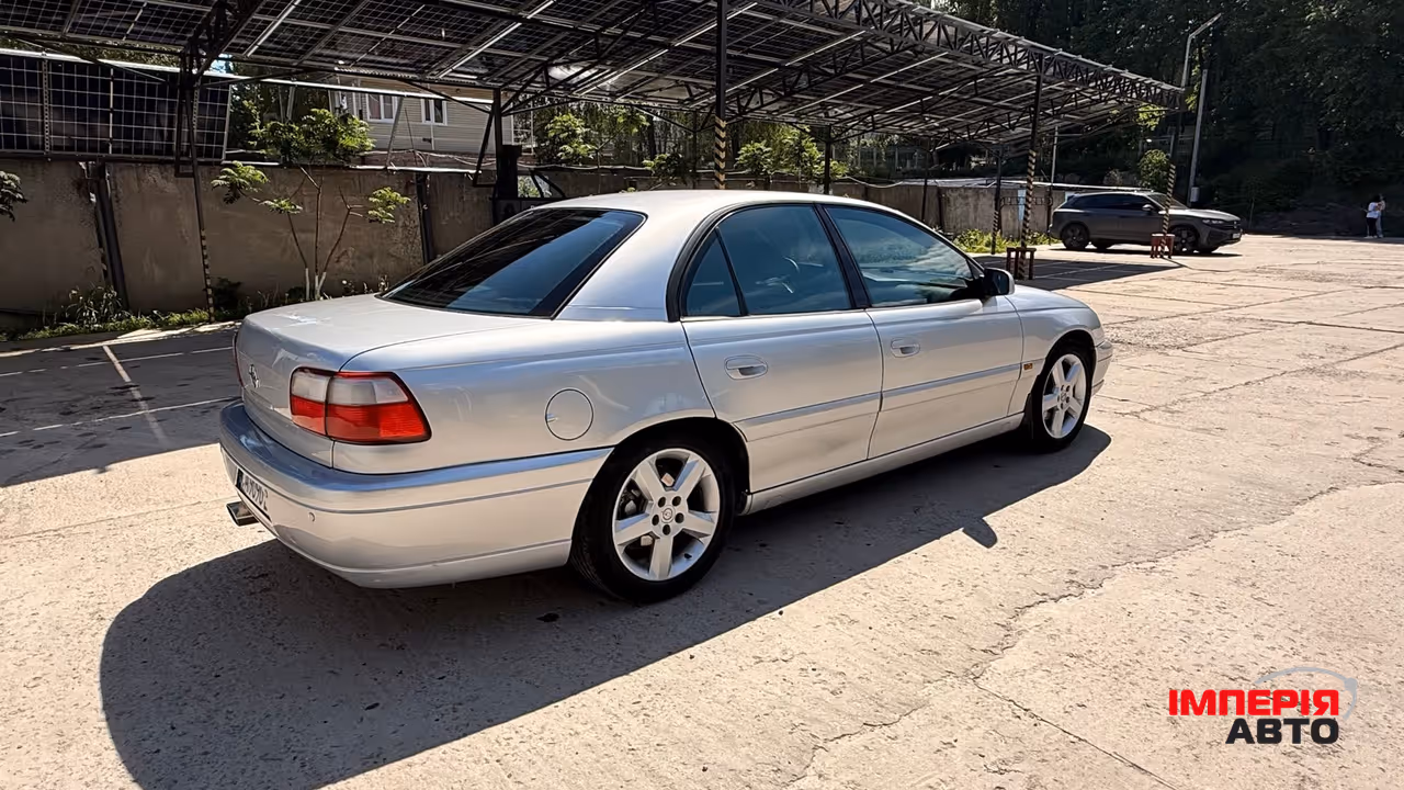 Opel Omega - фото 19