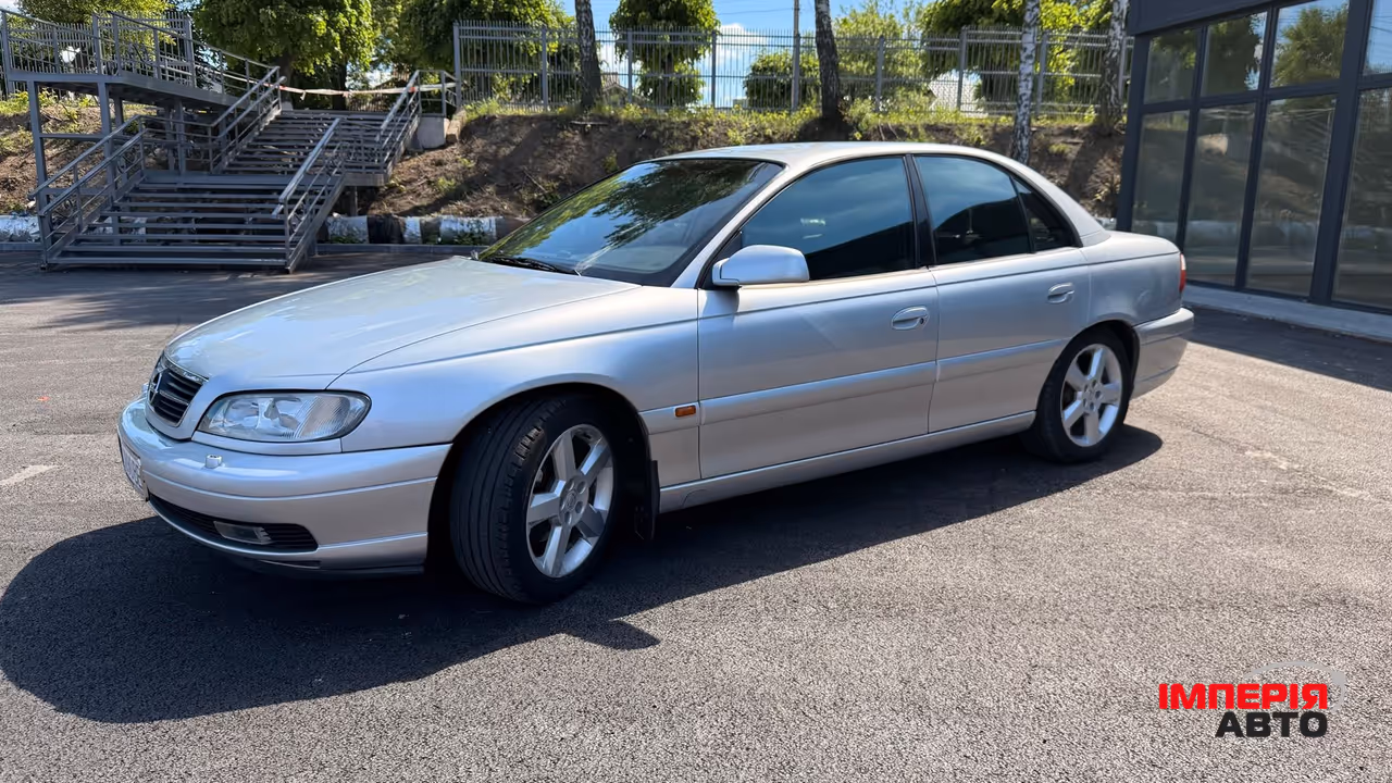 Opel Omega - фото 39