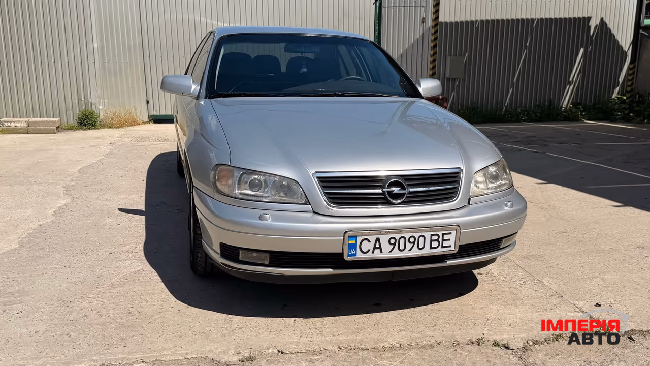 Opel Omega - фото 23
