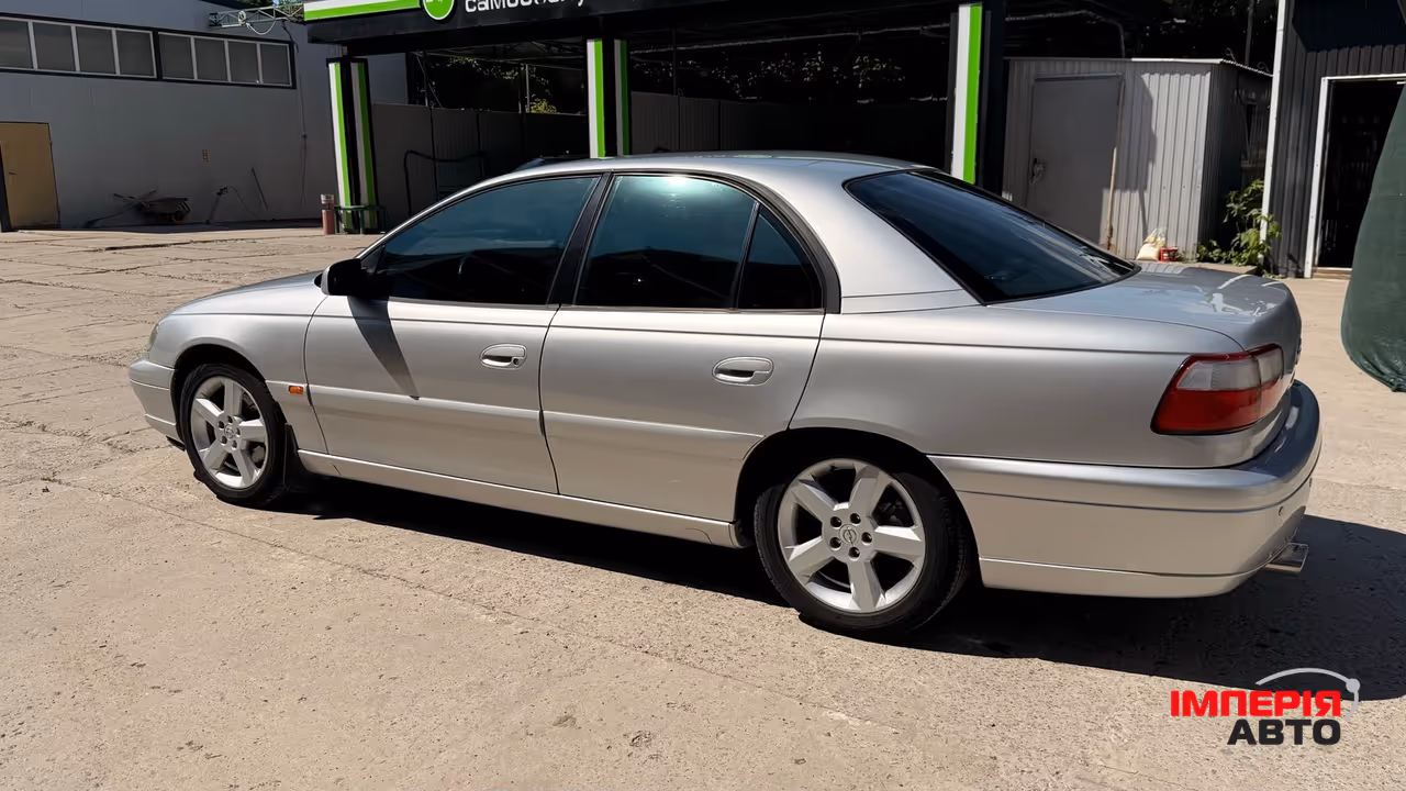 Opel Omega - фото 16