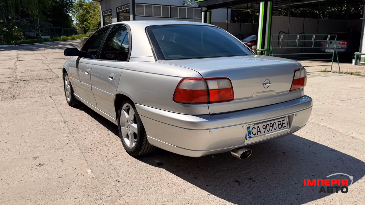 Opel Omega - фото 17
