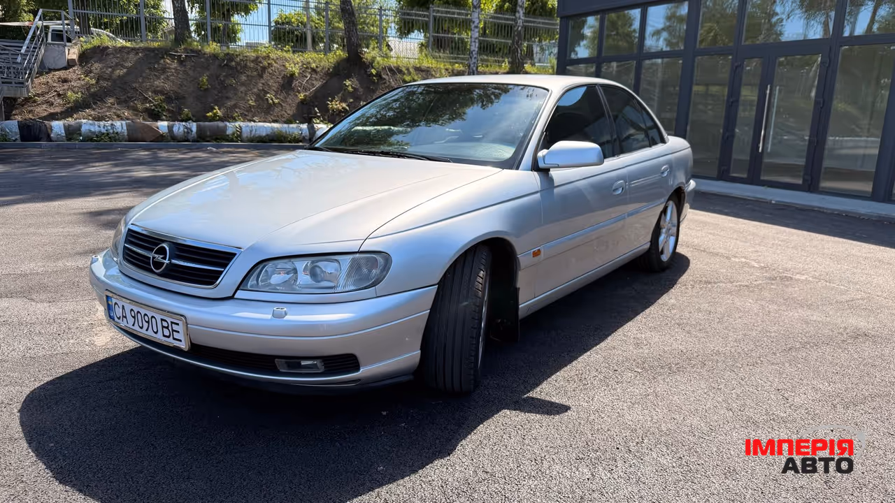 Opel Omega - фото 40