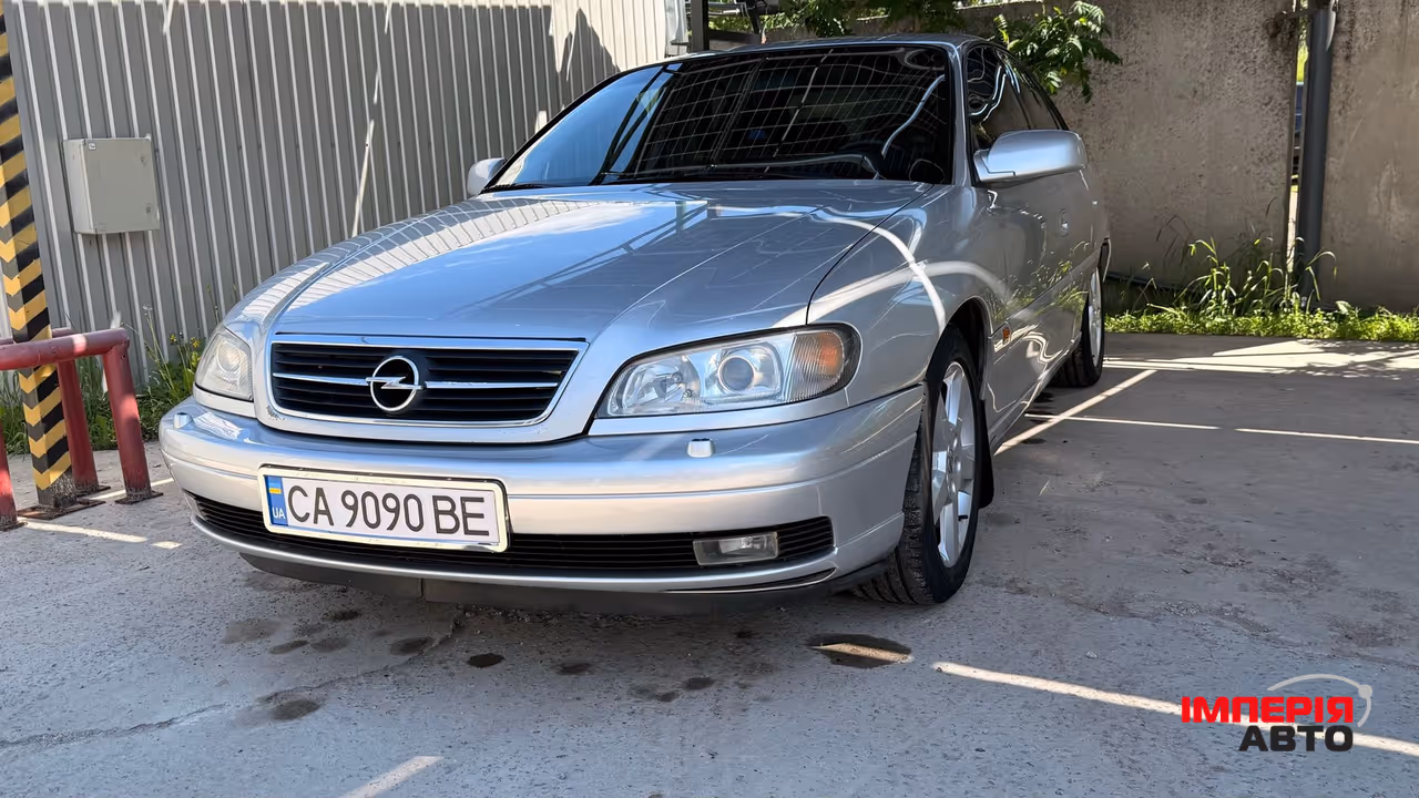Opel Omega - фото 7