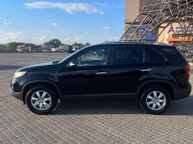 Kia Sorento - фото 5