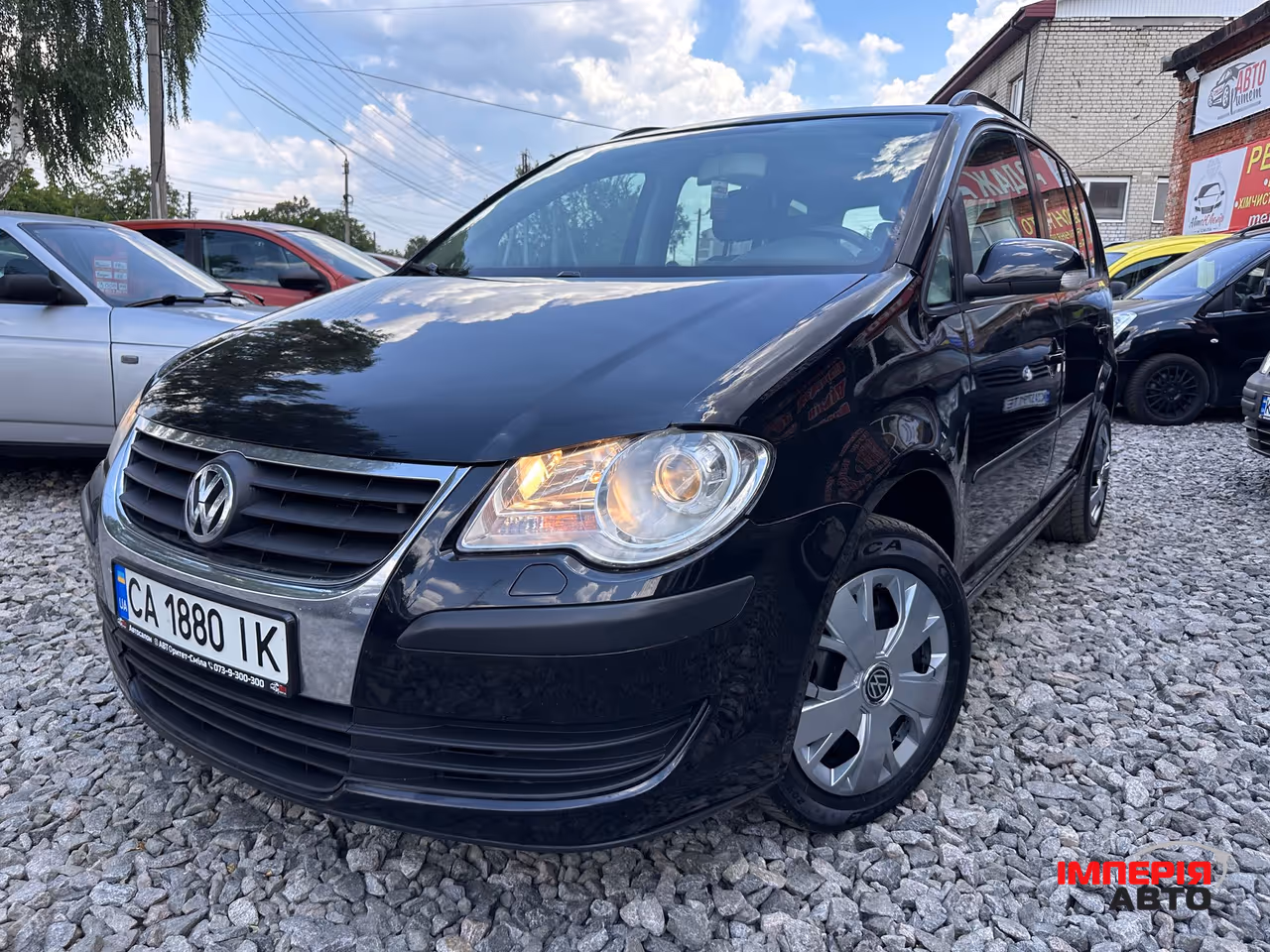 Volkswagen Touran - фото 2