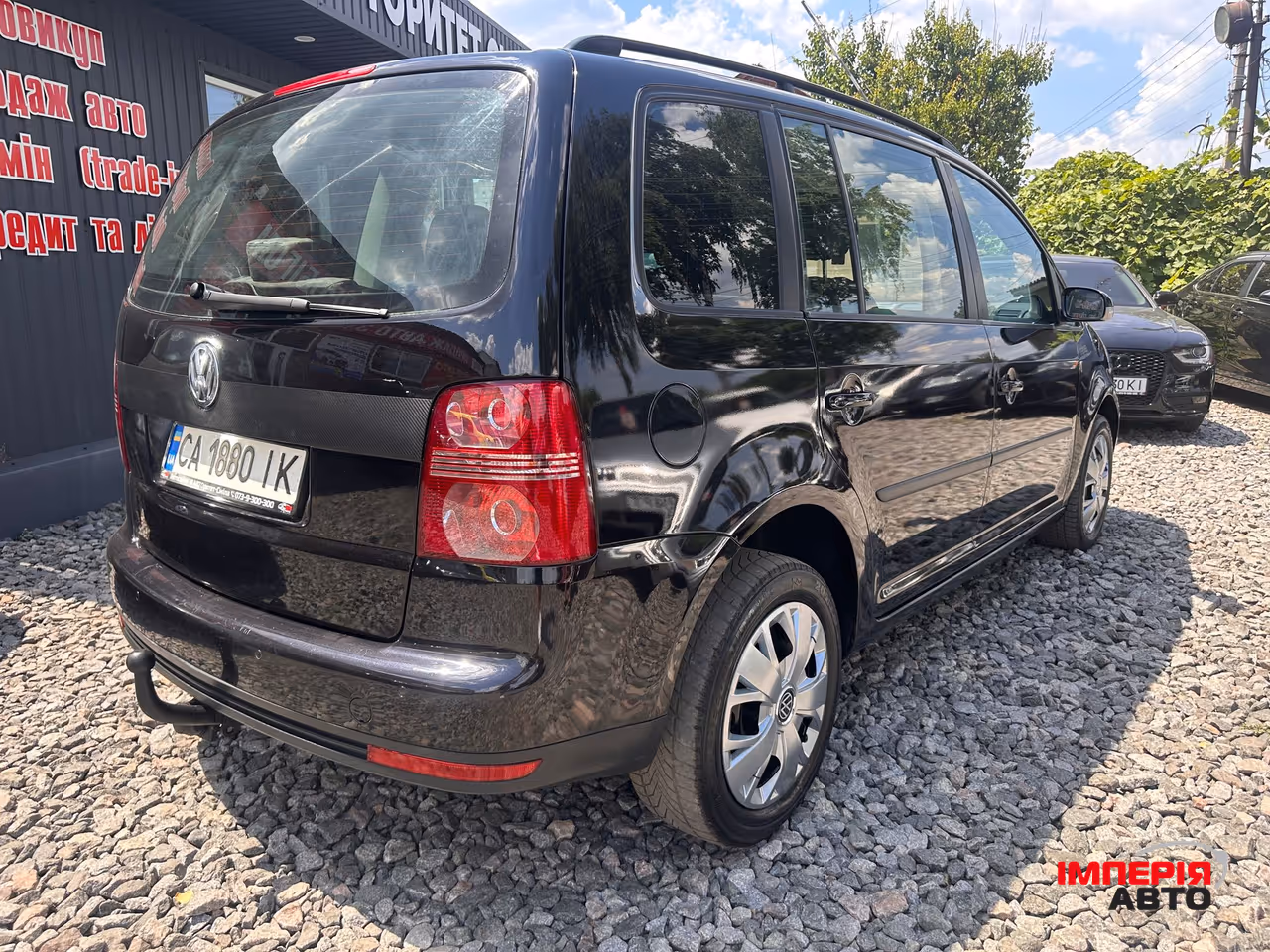 Volkswagen Touran - фото 10