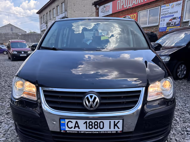 Volkswagen Touran - фото 3