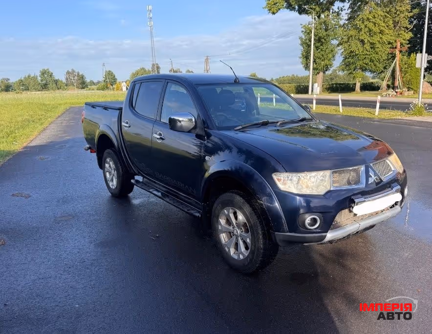 Mitsubishi L200 - фото 1