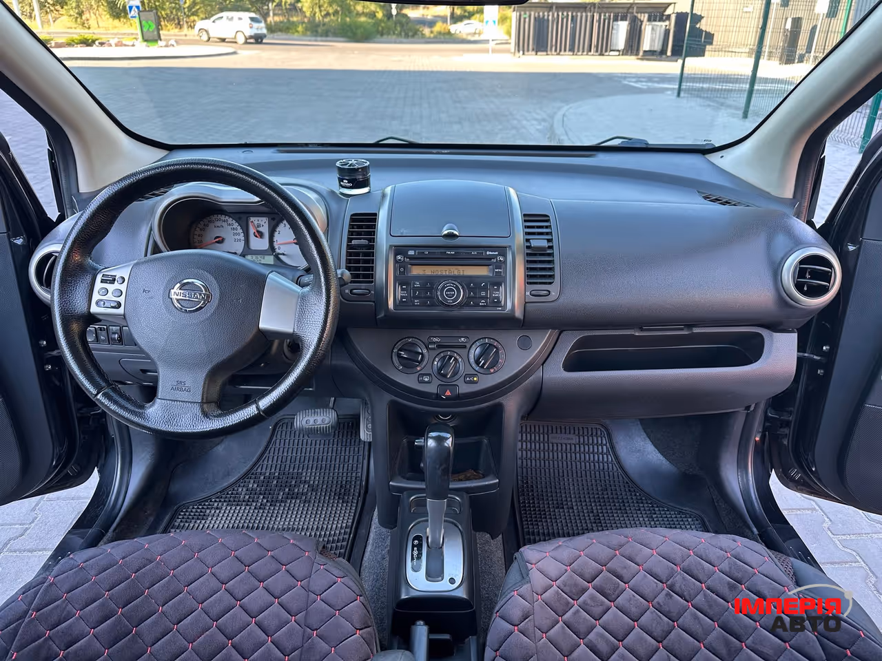Nissan Note - фото 13