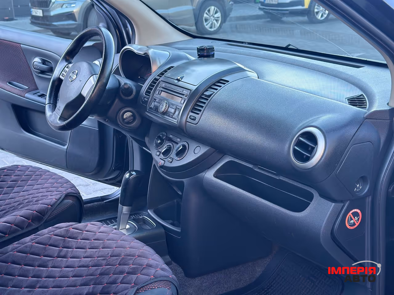 Nissan Note - фото 11