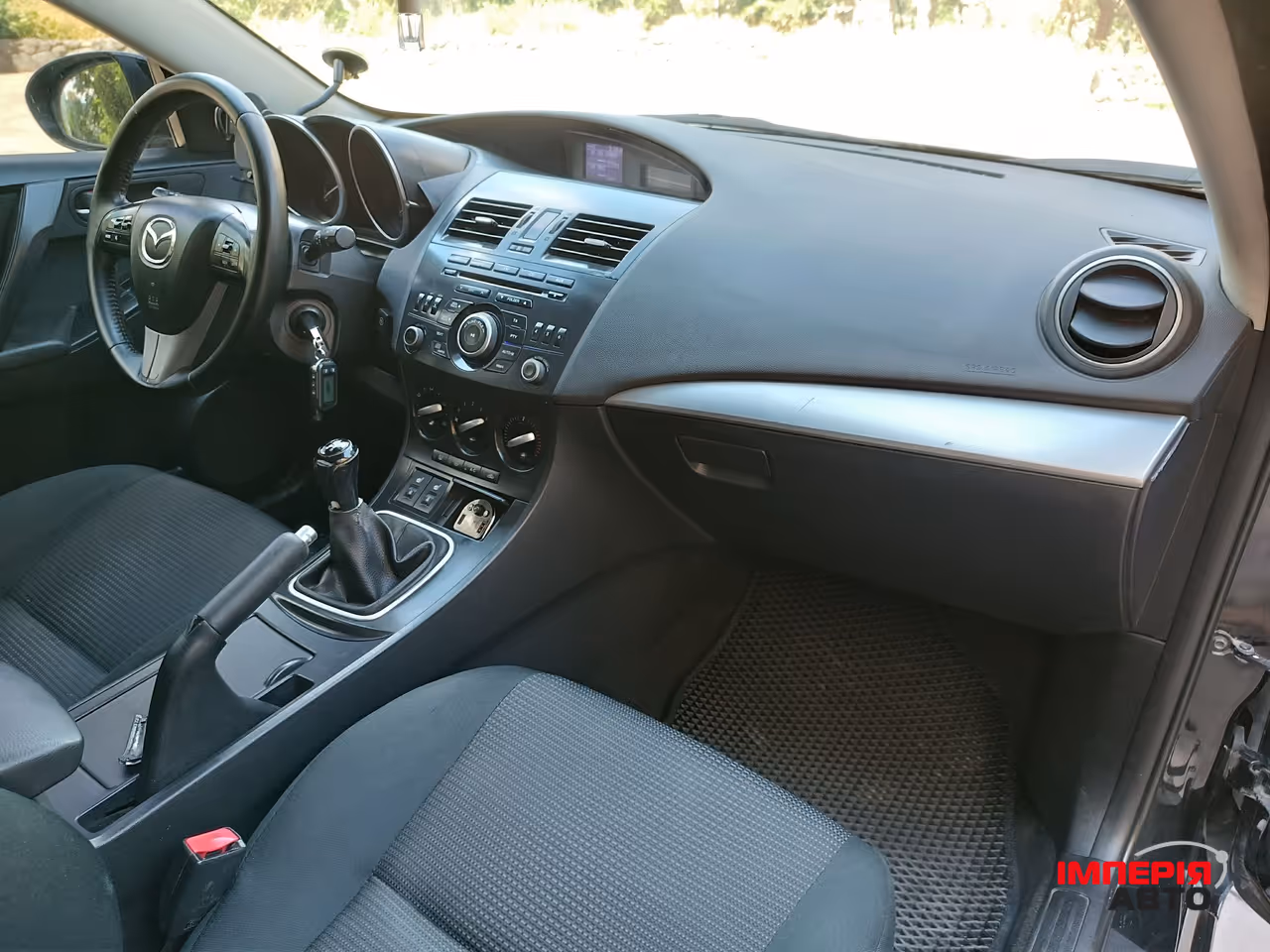 Mazda 3 - фото 12