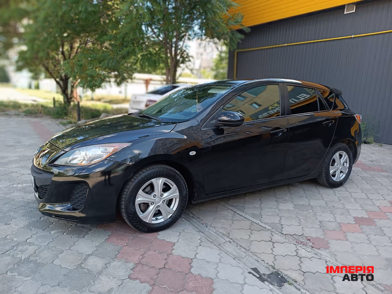 Mazda 3 - фото 2