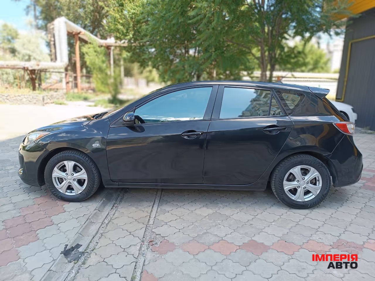 Mazda 3 - фото 7