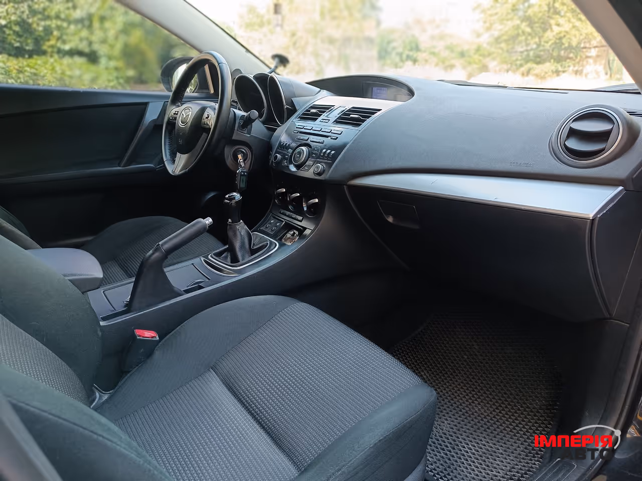 Mazda 3 - фото 14