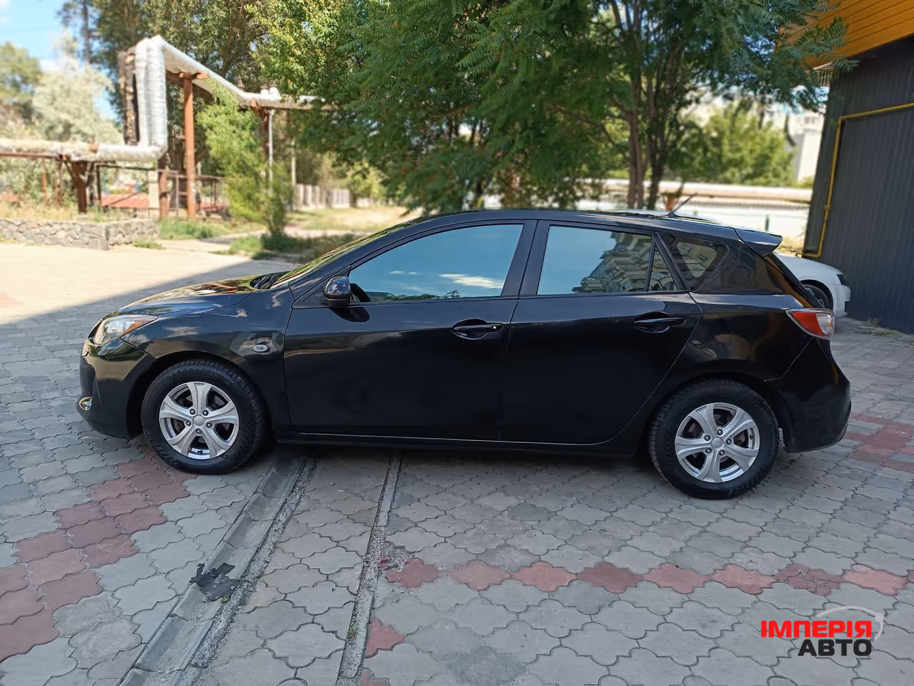 Mazda 3 - фото 4