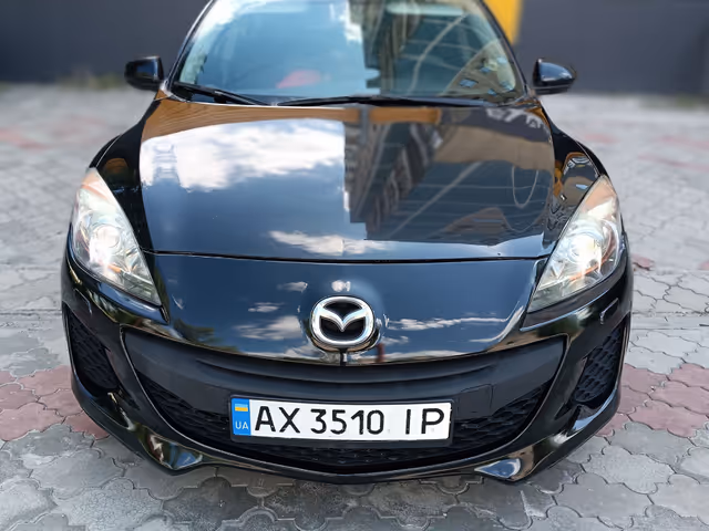 Mazda 3 - фото 1