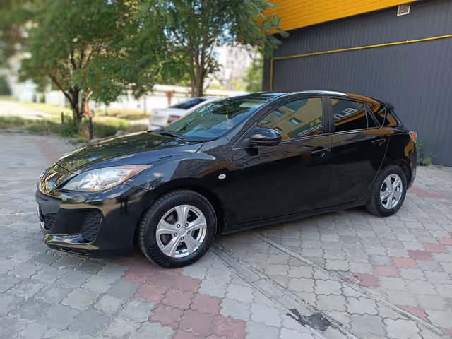 Mazda 3 - фото 2