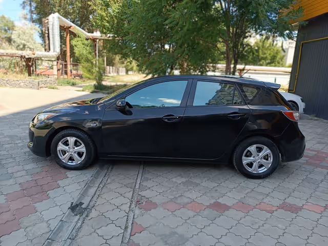 Mazda 3 - фото 4
