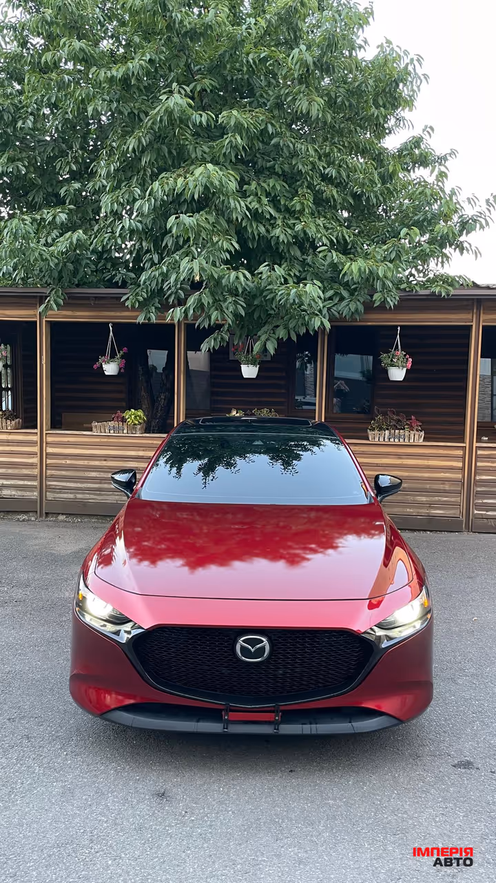Mazda 3 - фото 2
