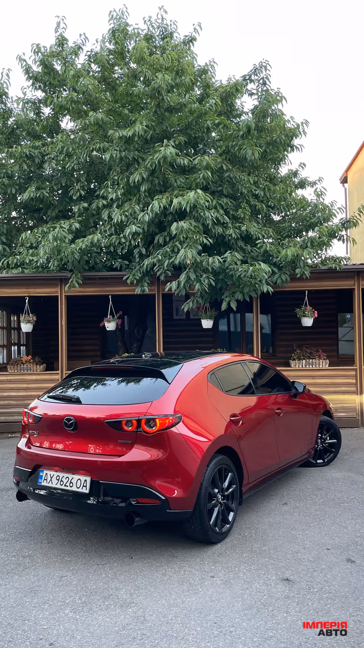 Mazda 3 - фото 6