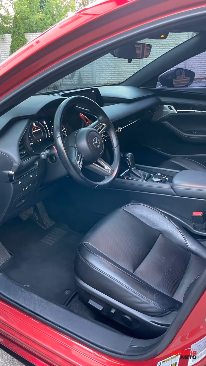 Mazda 3 - фото 7