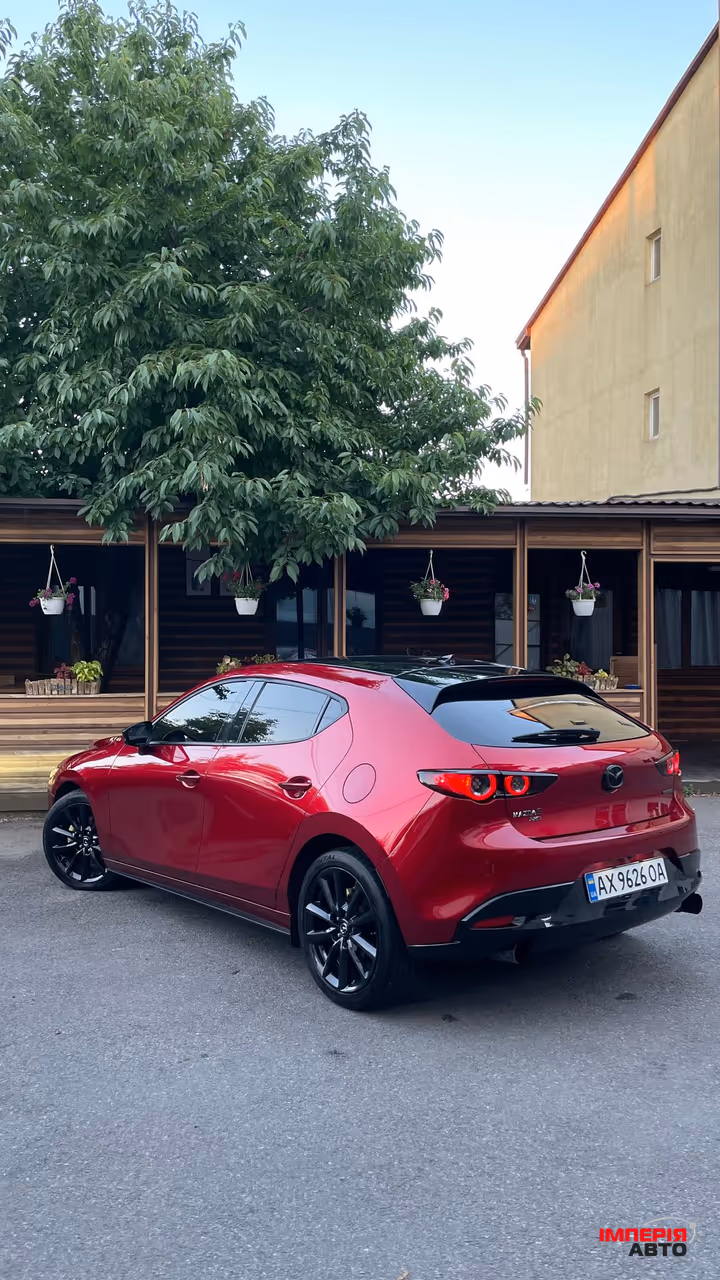 Mazda 3 - фото 4