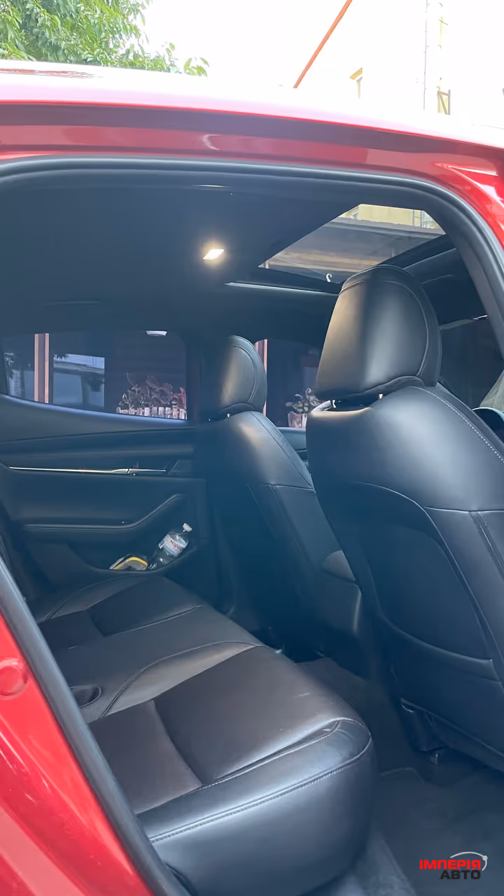 Mazda 3 - фото 10