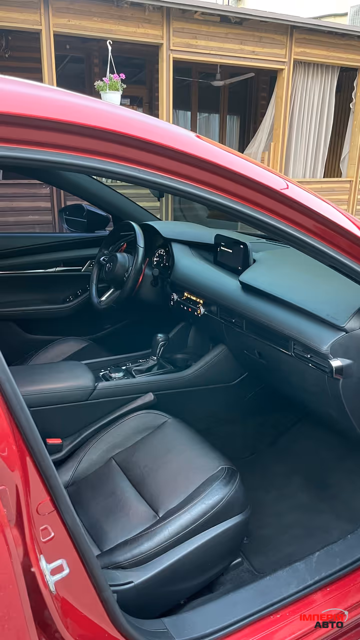 Mazda 3 - фото 11