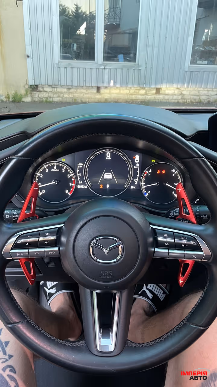 Mazda 3 - фото 12