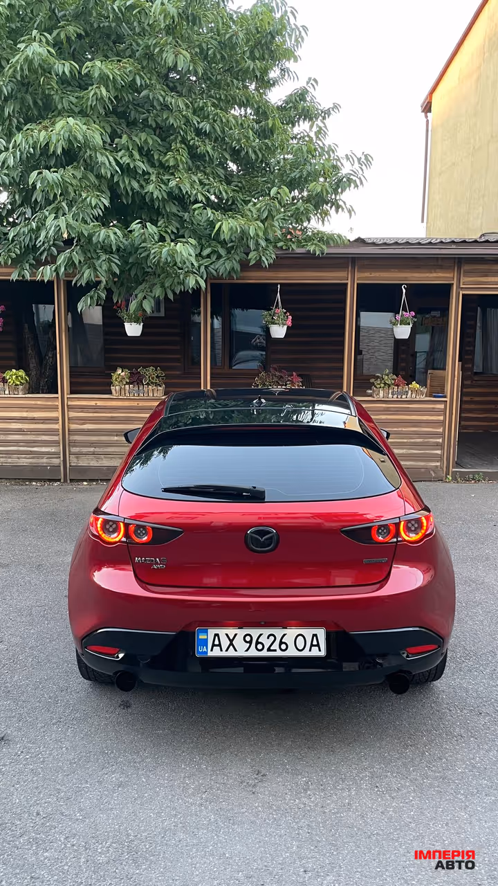 Mazda 3 - фото 5