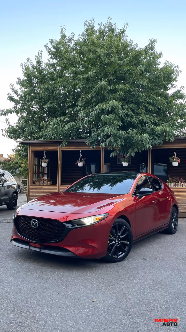 Mazda 3 - фото 3